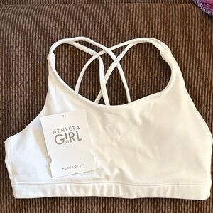 Athleta Girl Upbeat Sports Bra
Kids size XL
Includes removable pads 
Like new